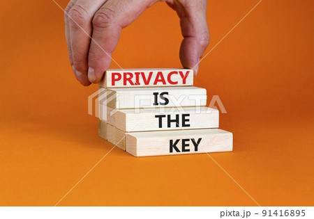 Privacy is the key symbol. Concept words Privacy is the key on wooden blocks on a beautiful orange table orange background. Businessman hand. Business, finacial and privacy is the key concept. Privacy is the key symbol. Concept words Privacy is the key on wooden blocks on a beautiful orange table orange background. Businessman hand. Business, finacial and privacy is the key concept. 91416895