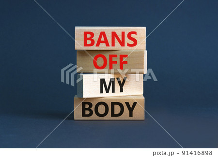 Bans off my body symbol. Concept words Bans off my body on wooden blocks on a beautiful grey table grey background. Women rights concept. Business social issues and bans off my body concept. Bans off my body symbol. Concept words Bans off my body on wooden blocks on a beautiful grey table grey background. Women rights concept. Business social issues and bans off my body concept. 91416898