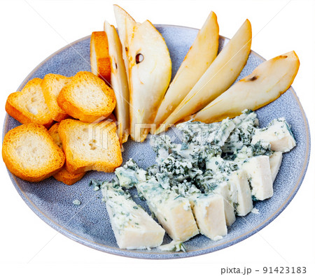 Blue cheese served on plate with pear Blue cheese served on plate with pear 91423183