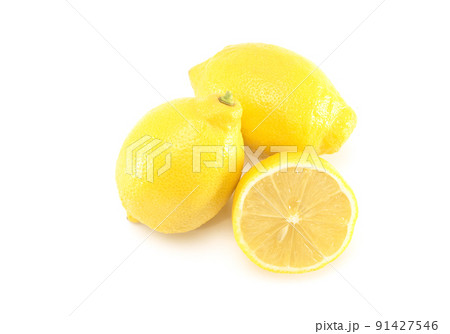 Fresh organic yellow lemon fruit with cut in half isolated on white background Fresh organic yellow lemon fruit with cut in half isolated on white background 91427546