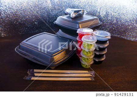 Set of delicious sushi rolls with wassabi and ginger in a box. Japanese food. Set of delicious sushi rolls with wassabi and ginger in a box. Japanese food. 91429131