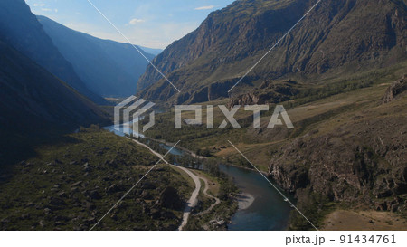 Valley Chulyshman with river and and mountains with blue clear sky in Altai Valley Chulyshman with river and and mountains with blue clear sky in Altai 91434761