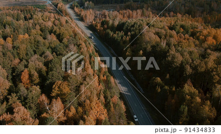 Asphalt road with traffic cars between forest in Ural Asphalt road with traffic cars between forest in Ural 91434833