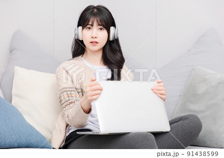Asian girl living at home 91438599