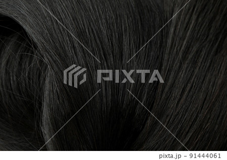 Brunette female hair on whole background, close up Brunette female hair on whole background, close up 91444061