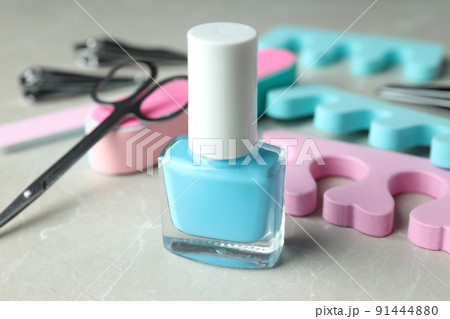 Concept of nail care with manicure accessories on light textured background Concept of nail care with manicure accessories on light textured background 91444880