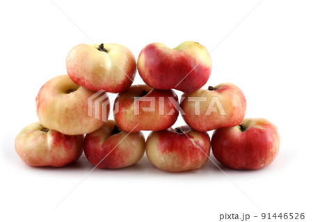 Flat peach (doughnut peach, donut peach, UFO peach, peento peach, saucer peach). Ancient Chinese variety "Pan tao". Delicacy 91446526