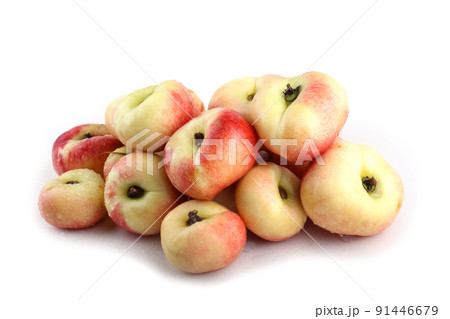 Flat peach (doughnut peach, donut peach, UFO peach, peento peach, saucer peach). Ancient Chinese variety "Pan tao". Delicacy 91446679