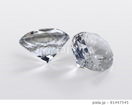 Shiny brilliant diamond placed on gray background Shiny brilliant diamond placed on gray background 91447545