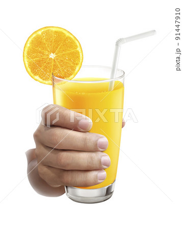Young man holding orange juice , closeup shot Young man holding orange juice , closeup shot 91447910