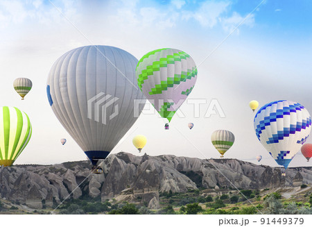 Cappadocia balloons in turkey. Balloons at dawn in the valley of love. 91449379