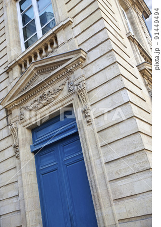 Stone architecturte and stylish blue wooden door Stone architecturte and stylish blue wooden door 91449494