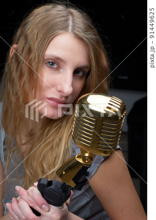 Pretty woman with microphone Pretty woman with microphone 91449625