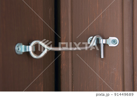 Rustic hook and eye door lock for doors locking. 91449689