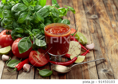 Homemade tomato sauce and ingredients. 91450103