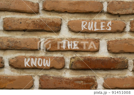 Know the rules and support symbol. Concept words Know the rules on brick wall. Beautiful brick wall background. Business and support know the rules quote concept. Copy space. 91451008
