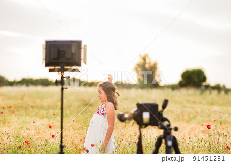 hispanic girl doing a viral dance for social network mobile smartphone application. lifestyle 91451231