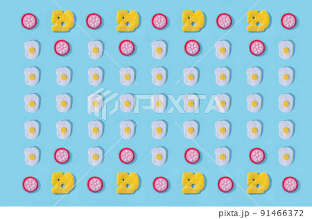 Toys in the form of food hand made of felt on blue background. Hand sewing. Minimal artistic food concept. Toys in the form of food hand made of felt on blue background. Hand sewing. Minimal artistic food concept. 91466372