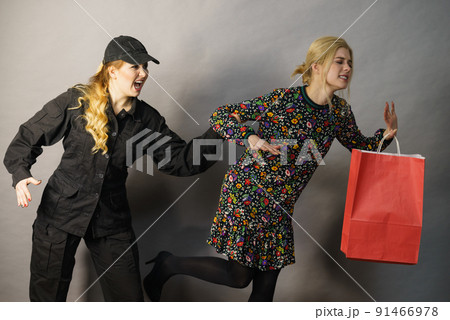 Security guard and shoplifter. Security guard and shoplifter. 91466978
