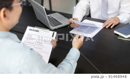 Job interview, Employer or recruiter is interviewing and taking the applicant's work history, Specialized Functional Ability Test, Business conversation, Manager resource employment and recruitment. 91468948
