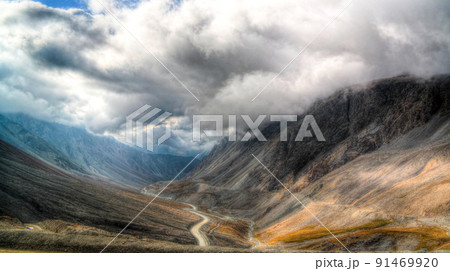 serpentine road to Barskoon pass, river and gorge and Sarymoynak pass, Jeti-Oguz, Kyrgyzstan 91469920