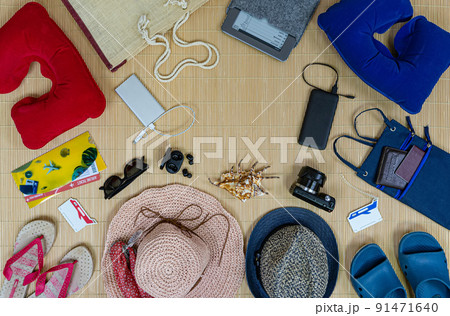 Family vacation accessories on the beach mate. Top view. Family vacation accessories on the beach mate. Top view. 91471640