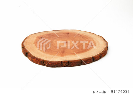 Wooden stand for a dish isolated on a white background. Tree trunk cut for product presentation demonstration 91474052