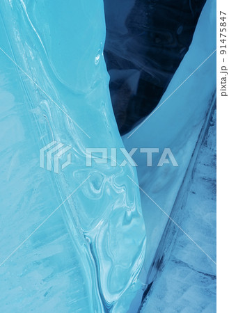 Ice hummocks on Baikal Lake. Transparent blue ice floe at sunset. Natural background. Ice hummocks on Baikal Lake. Transparent blue ice floe at sunset. Natural background. 91475847
