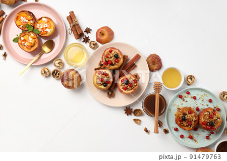 Concept of tasty food with baked apples on white background 91479763