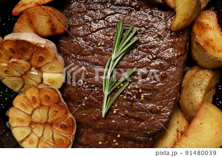 Concept of tasty food with beef steak, close up Concept of tasty food with beef steak, close up 91480039