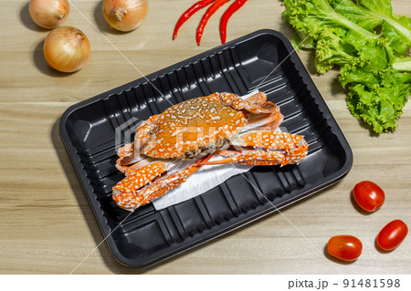 crab on plastic packaging with food absorbent in supermarket, Good quality for food store 91481598
