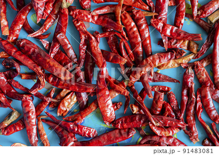 Dried chilies in a tray Dried chilies in a tray 91483081