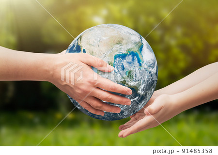 Earth globe in hands. World environment day 91485358