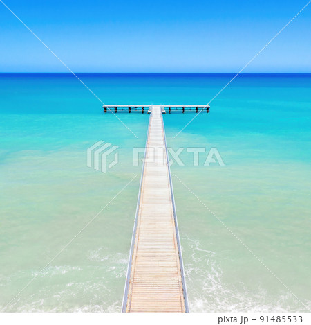 Wooden pier out to sea perspective. View from above Wooden pier out to sea perspective. View from above 91485533