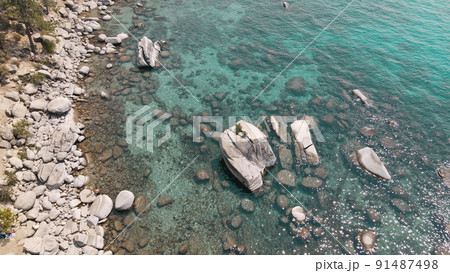 Crystal clear Lake Tahoe rocky shoreline near by Bonsai rock Crystal clear Lake Tahoe rocky shoreline near by Bonsai rock 91487498