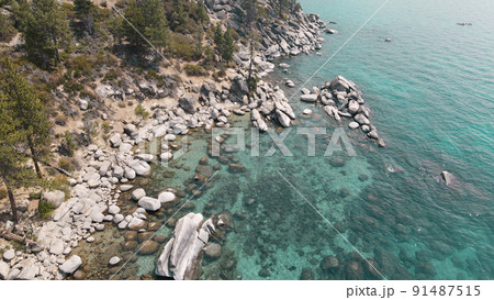 Crystal clear Lake Tahoe rocky shoreline near by Bonsai rock Crystal clear Lake Tahoe rocky shoreline near by Bonsai rock 91487515