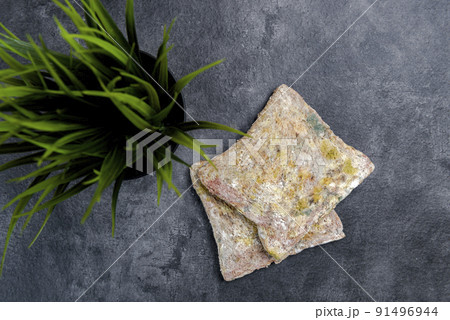 Moldy slice of bread Moldy slice of bread 91496944