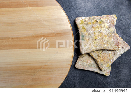 Moldy slice of bread Moldy slice of bread 91496945