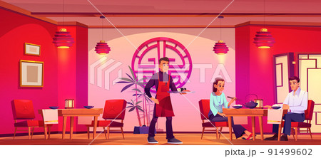 Man waiter services couple in chinese restaurant 91499602