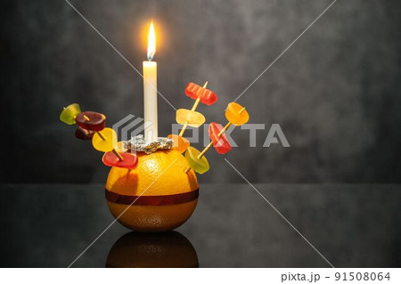 Orange Christingle is a symbolic object used in the Advent, Christmas and Epiphany services of many Christian denominations 91508064