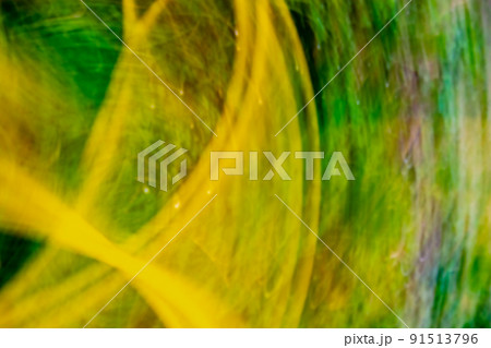 Radiation abstraction. Acid yellow green background. 91513796