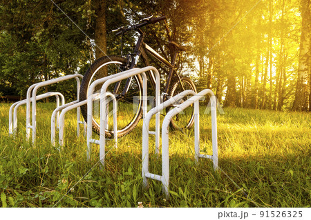 Sport bike parked in a forest Sport bike parked in a forest 91526325