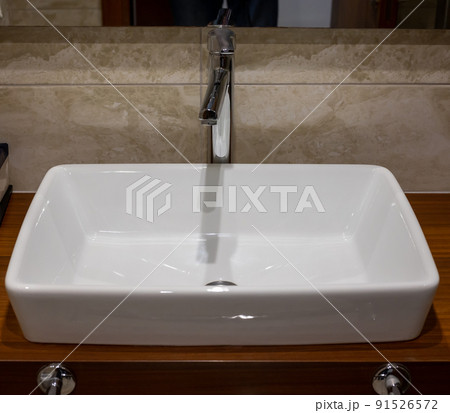 Bathroom sink. Stylish white sink in modern bathroom interior Bathroom sink. Stylish white sink in modern bathroom interior 91526572