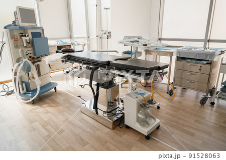 Interior of operation room with different medical equipment ready for surgery 91528063