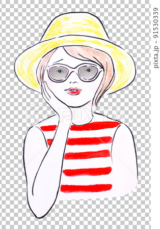 A woman wearing a hat and sunglasses to protect her from sunburn 91530339