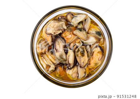 Marinated mussels isolated in a jar on a white background. Full depth of field. Marinated mussels isolated in a jar on a white background. Full depth of field. 91531248