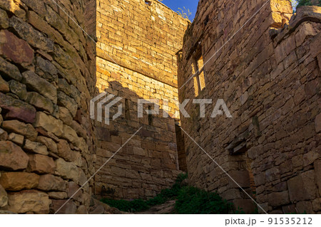 former street among the ruins in the abandoned mountain village of gamsutl in Dagestan former street among the ruins in the abandoned mountain village of gamsutl in Dagestan 91535212