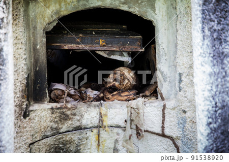 Desecrated graves in the cemetery of the old town of Armero destroyed by an avalanche caused by the Nevado del Ruiz Volcano in 1985 in Colombia 91538920