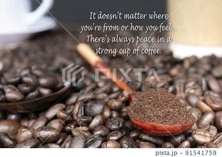Motivational and inspirational quote on cup of coffee on coffee beans background Motivational and inspirational quote on cup of coffee on coffee beans background 91541759