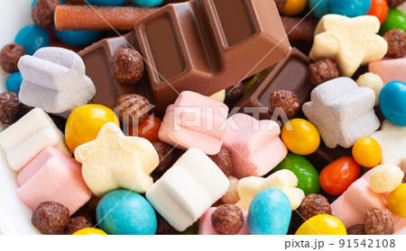 Assorted tasty candy lollipop as confectionery background Assorted tasty candy lollipop as confectionery background 91542108